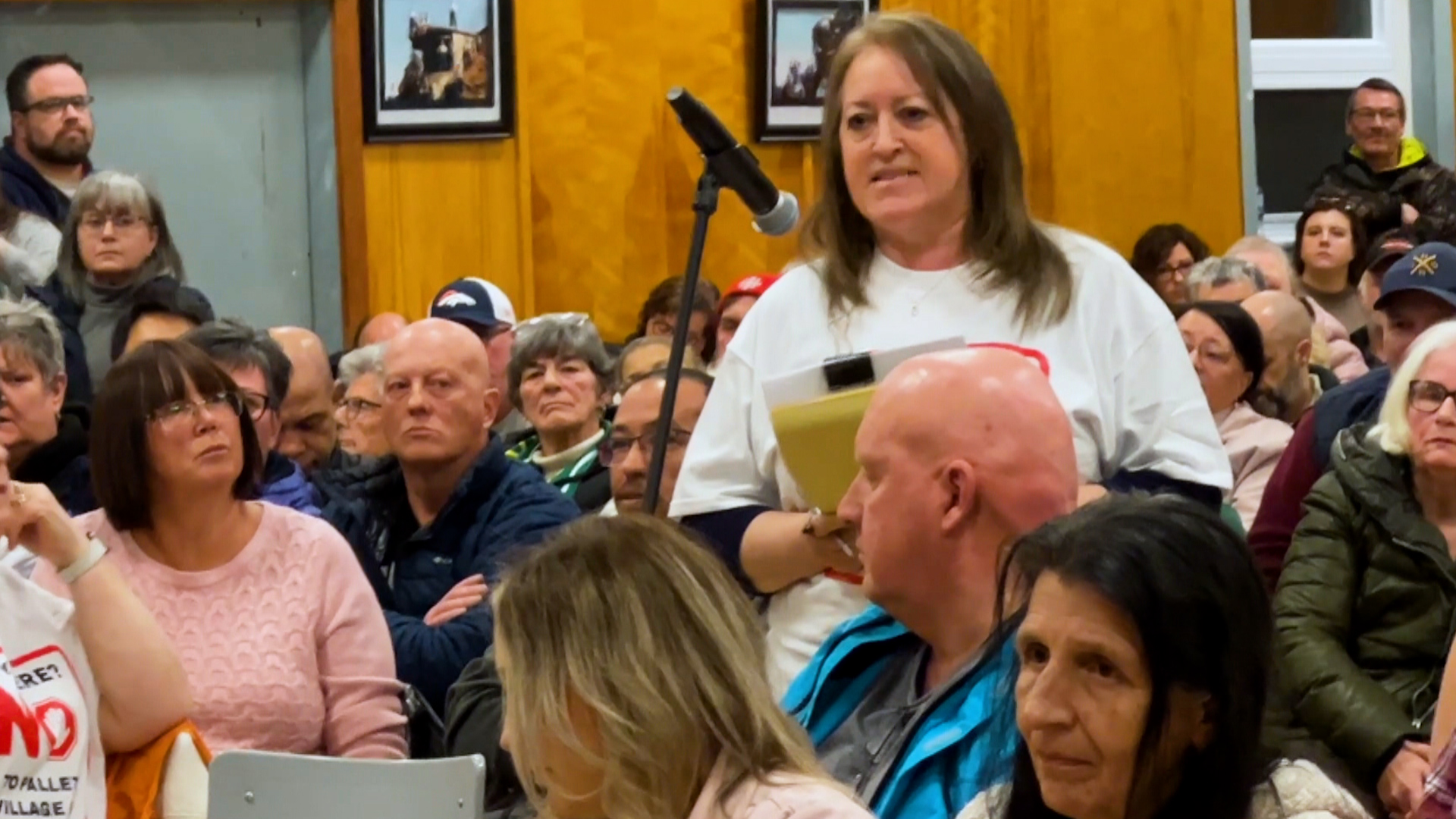 Emotions run high at Whitney Pier meeting on shelter village | CBC News