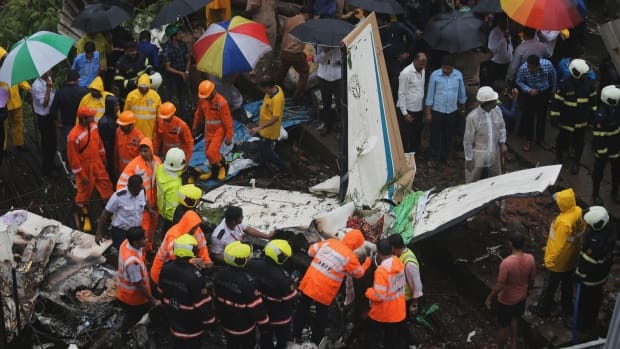 Plane Crashes In Crowded Mumbai District, Leaving 5 Dead | CBC News