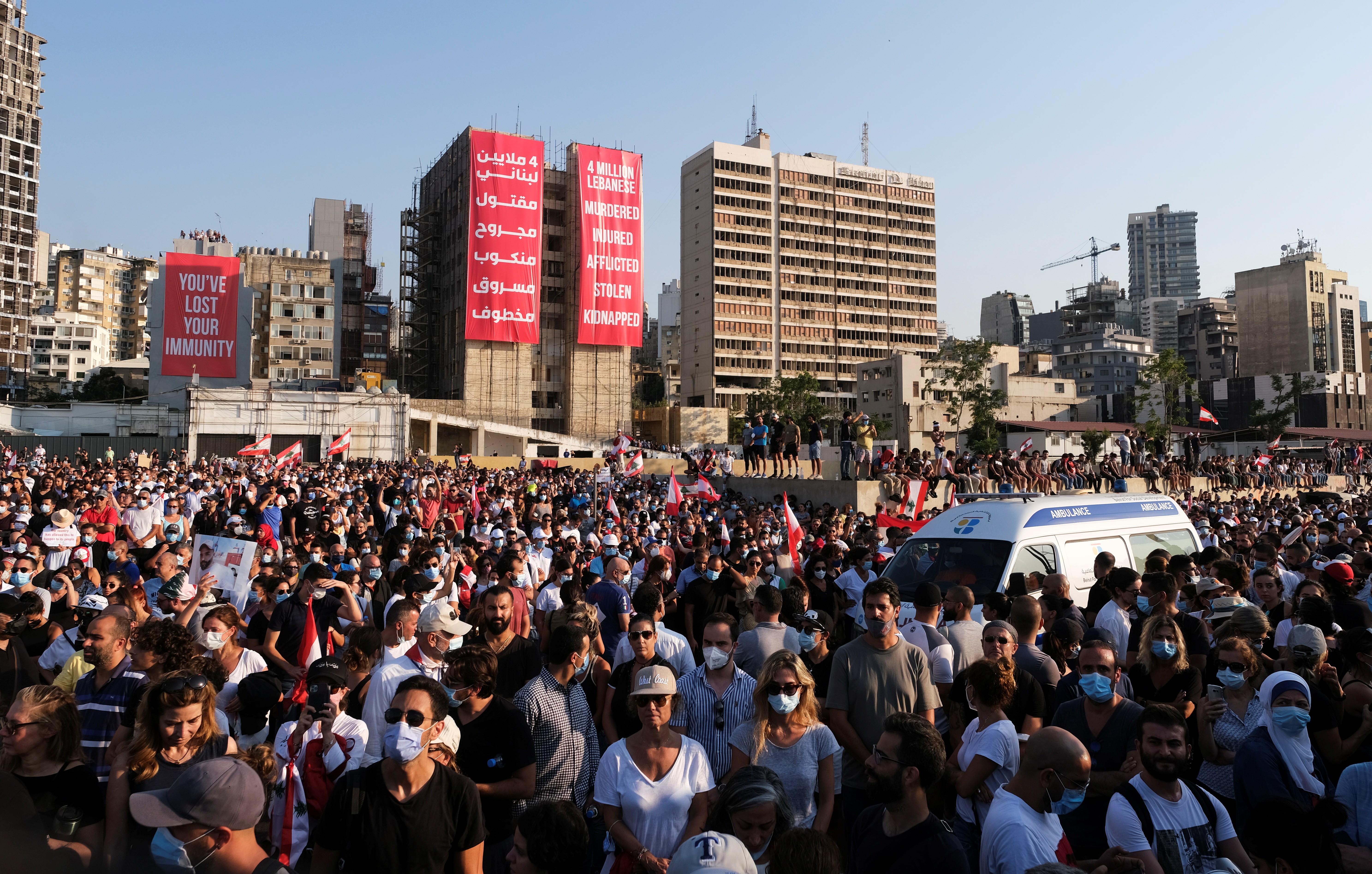 Thousands of Lebanese call for justice 1 year after massive explosion