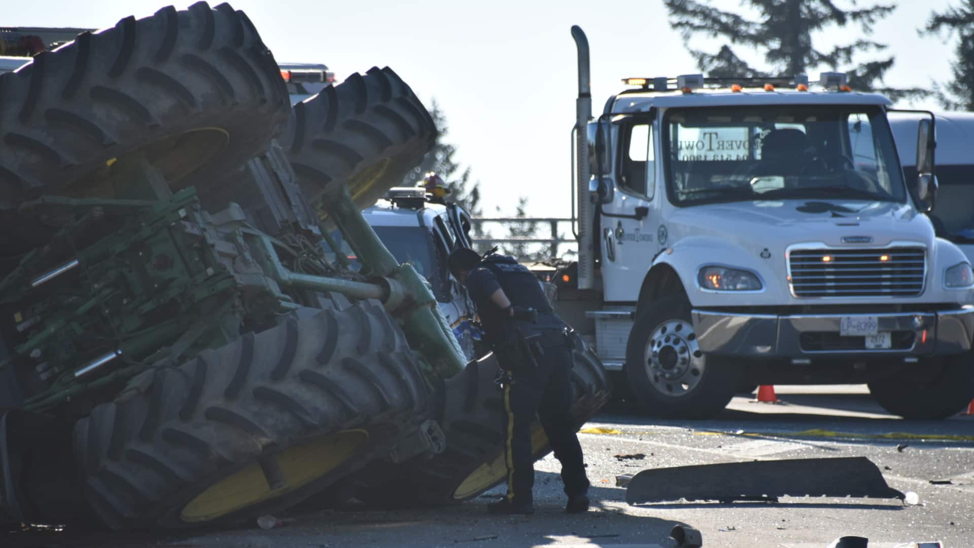 Roll Plow Sex Videos - Dramatic and unusual scene as tractor rolls over near Highway 1 in Surrey,  B.C. | CBC.ca