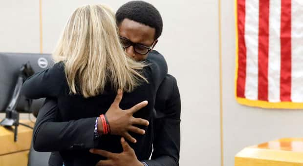 Man Embraces Former Dallas Police Officer Convicted Of Brother's Murder ...