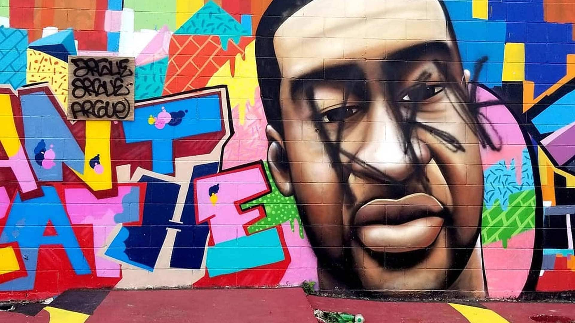 Daniel Anguilu on repairing his vandalized George Floyd mural | CBC.ca