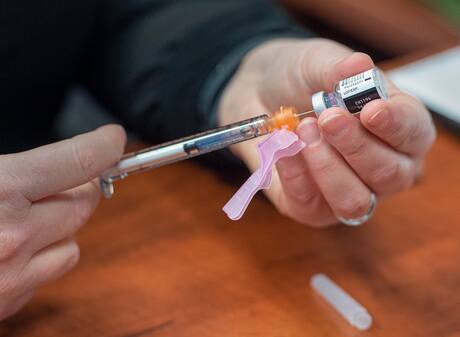 Canadian medical experts weigh in on debate over COVID-19 vaccine dose ...