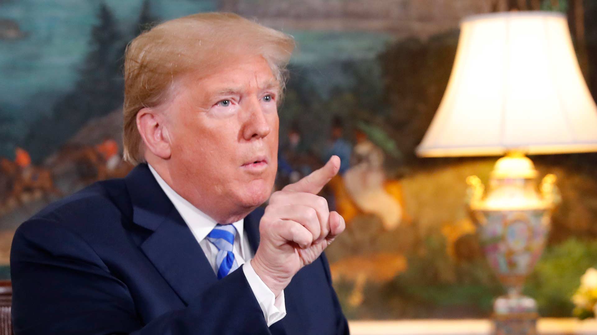 Trump pulls U.S. out of 'disastrous' Iran nuclear deal, will restore