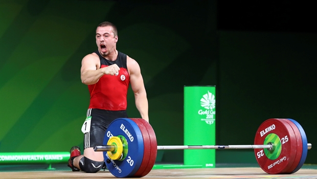 Canadian weightlifter settles for silver on day of drama at ...