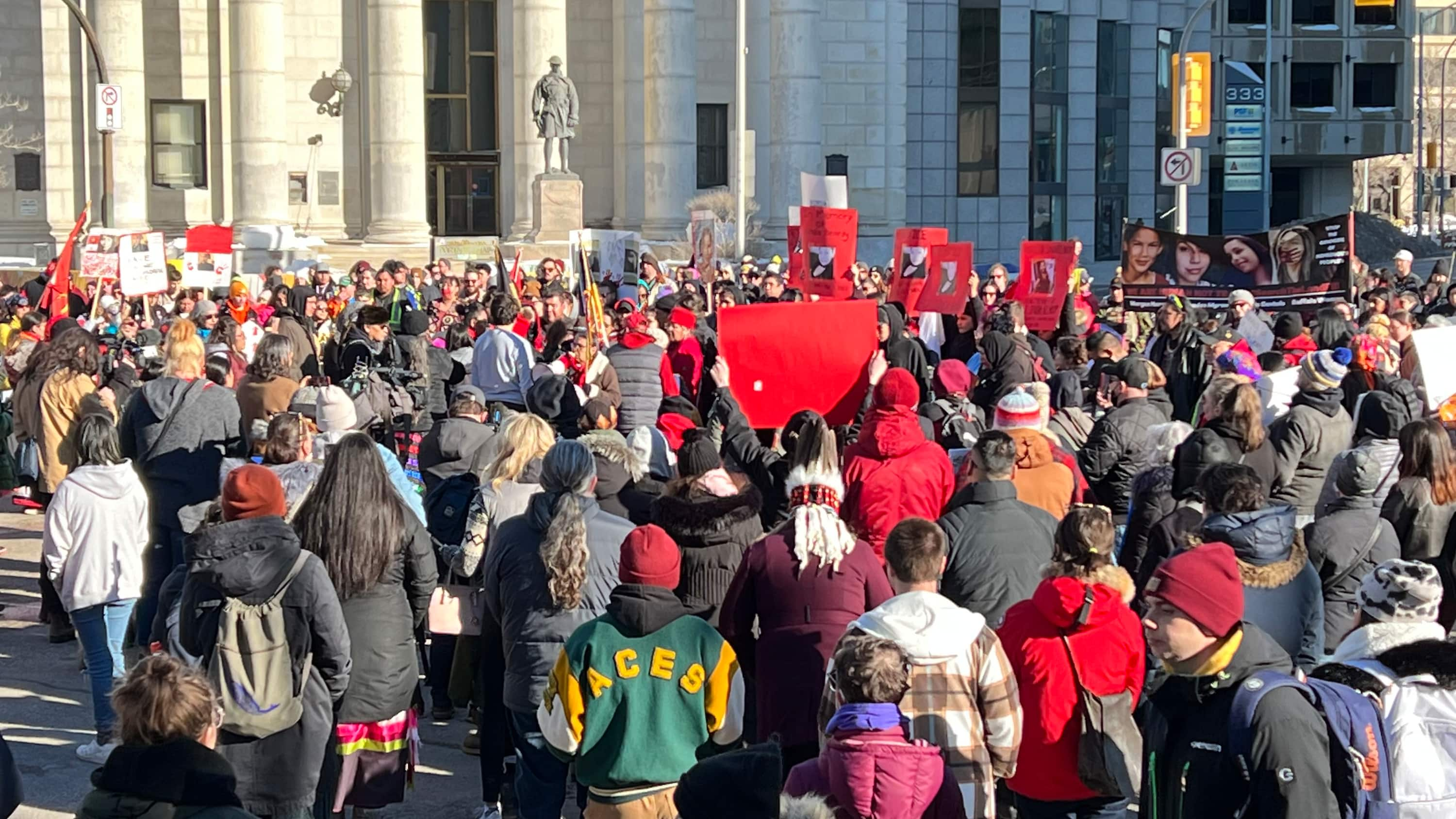 Hundreds chant 'we are not trash,' close Portage and Main in honour of ...