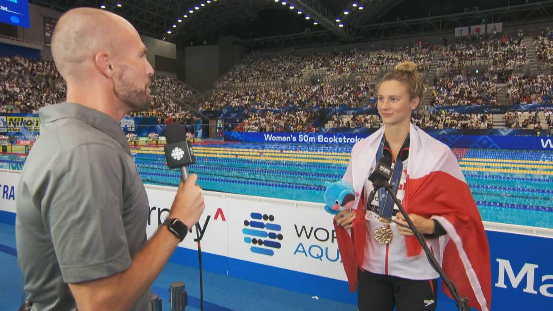 Summer McIntosh speaks to CBC Sports' Devin Heroux after winning gold